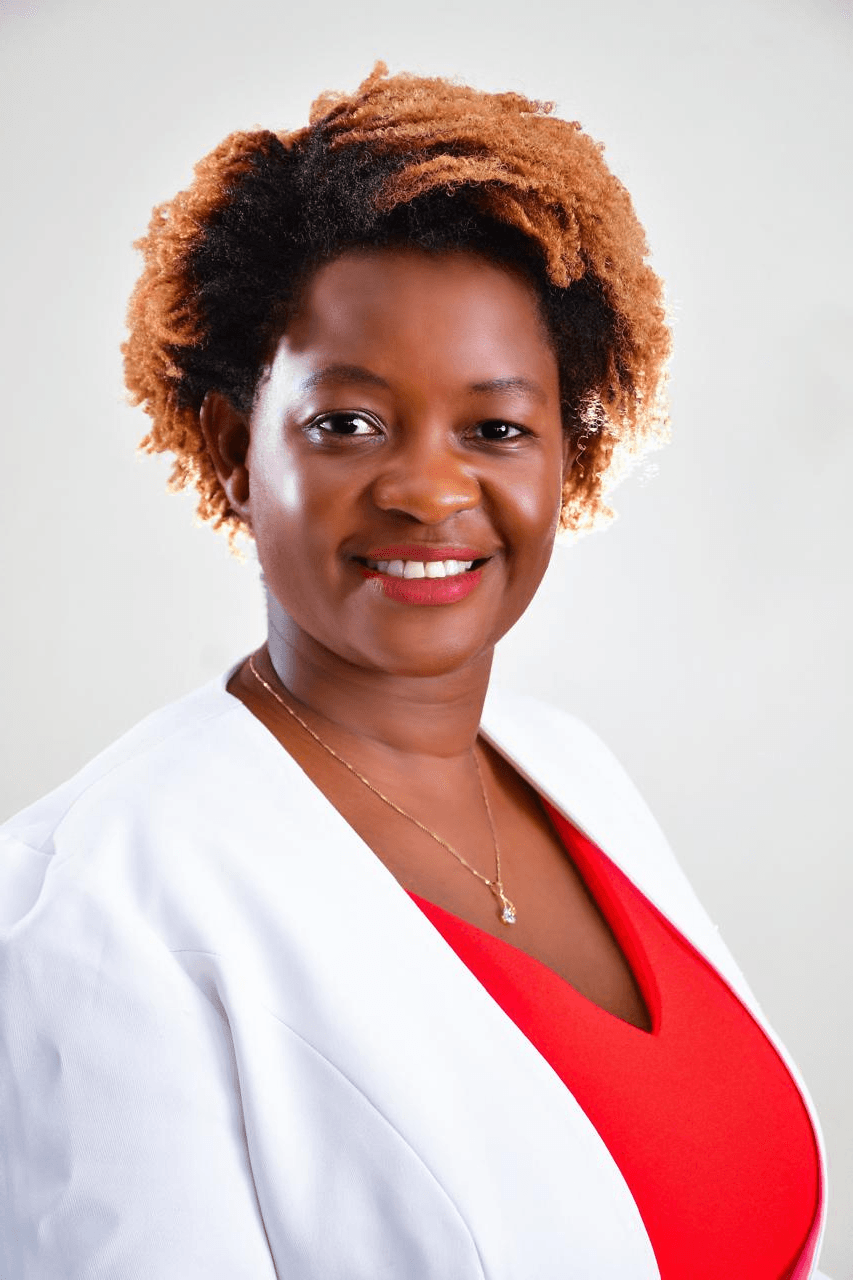 Portrait of a woman in a white blazer.